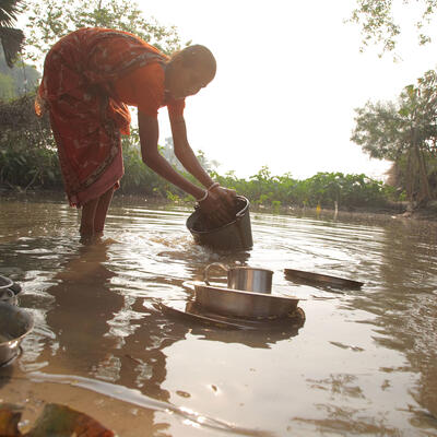 Woman washing in West Bengal