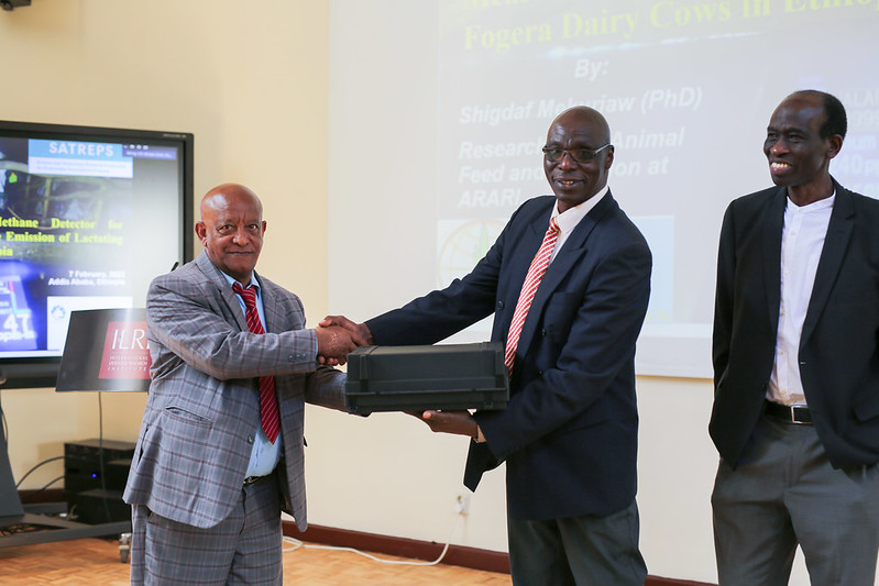 Okeyo Mwai and Raphael Mrode handover of laser methane detector equipment to state minister advisor Alemayehu Mekonnen of the Ethiopia Ministry of Agriculture.