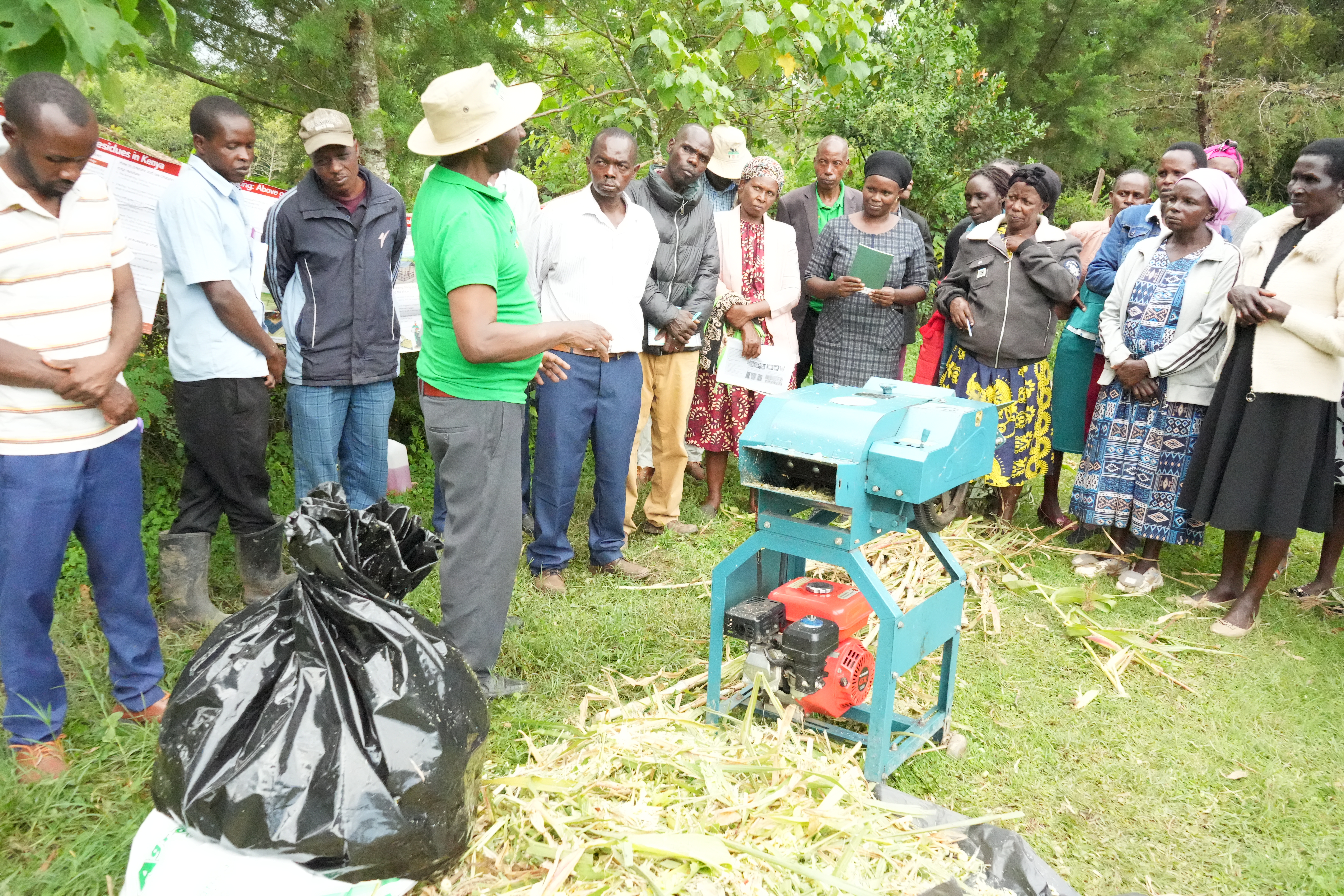 Farmers learning about silage making from Pioneer Farmer Joseph Bett. Photo credit: ILRI/Polycarp Onyango