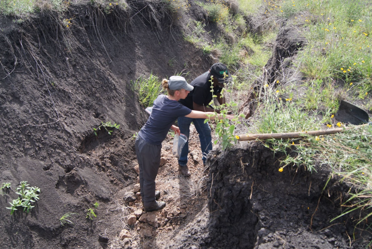 Fiona Pearce identifying the soil type with Dr. Charles Gachene, soil scientist from the University of Kenya