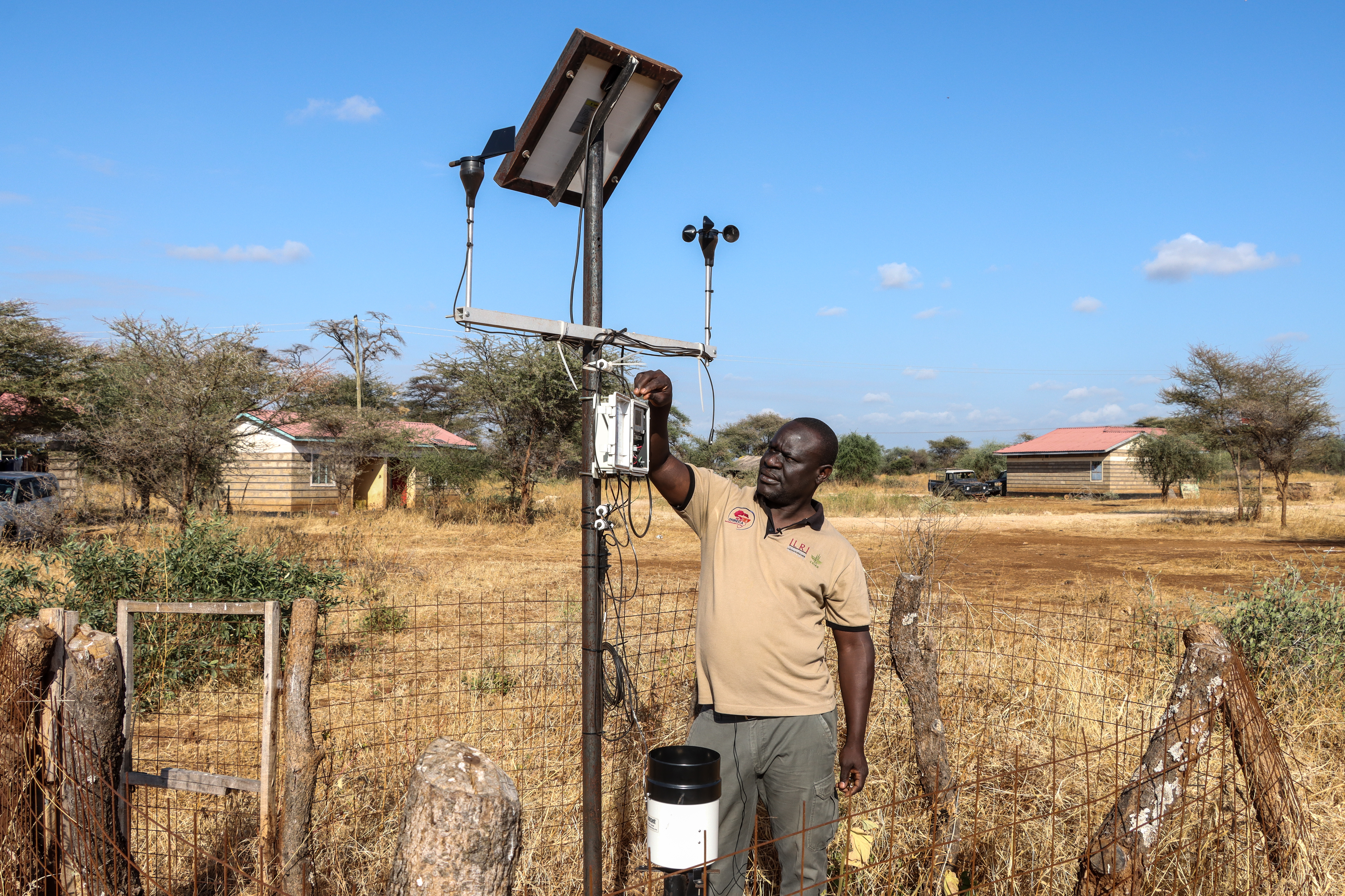 James inspects the weather station