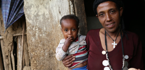 eje Kassa and her son at their home in West Gojam zone of Amhara region in Ethiopia (photo credit: ILRI). 