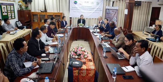 A group of people sitting at a table</p>
<p>AI-generated content may be incorrect.