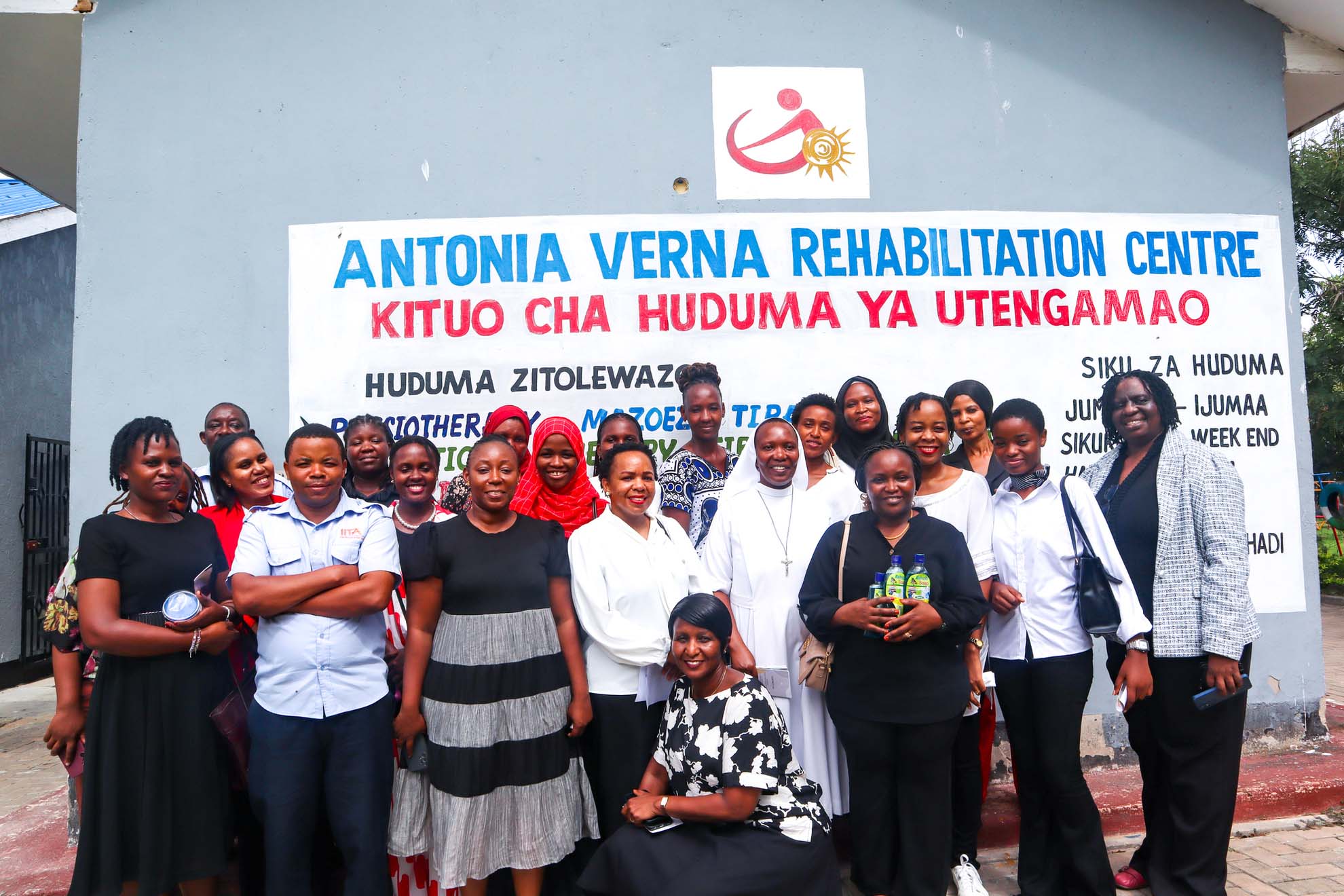 Group photo of CGIAR staff with Sr. Angela Jeremiah, Director of the Center during their visit. (Photo by ILRI/Gloriana Ndibalema)