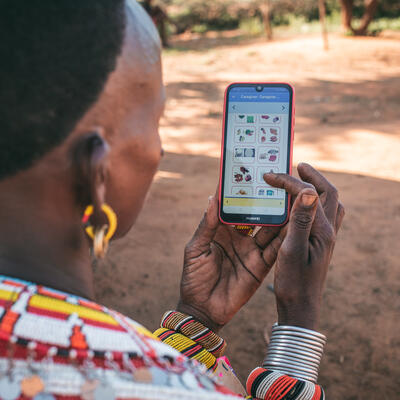 Samburu woman using the Mbiotisho app (ILRI).