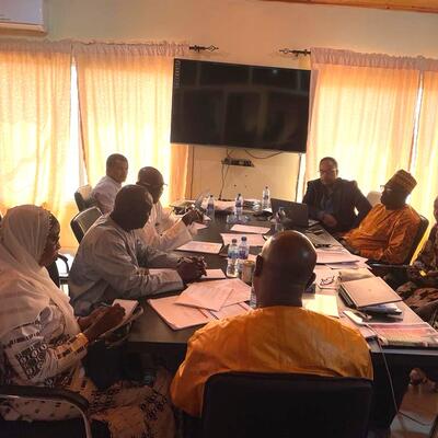Demba Sabally, the Gambian Minister for Agriculture meets with some of the ministry officials and stakeholders during one of the events to launching the Gambia LMP