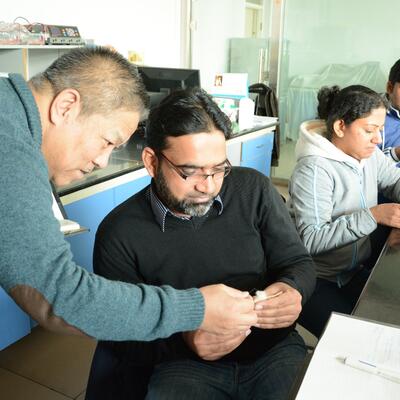 Han Jianlin with three visiting scientists at joint lab in China (ILRI)