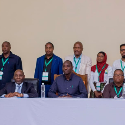 Research institute representatives with Livestock and Fisheries Minister Bashiru Ally (center, seated) at the rangeland conference in Morogoro.