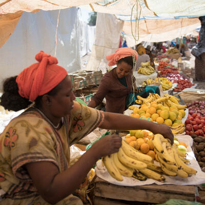 Women in the market (fruit products)
