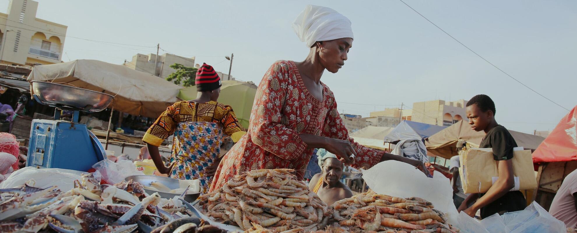 Woman selling fish