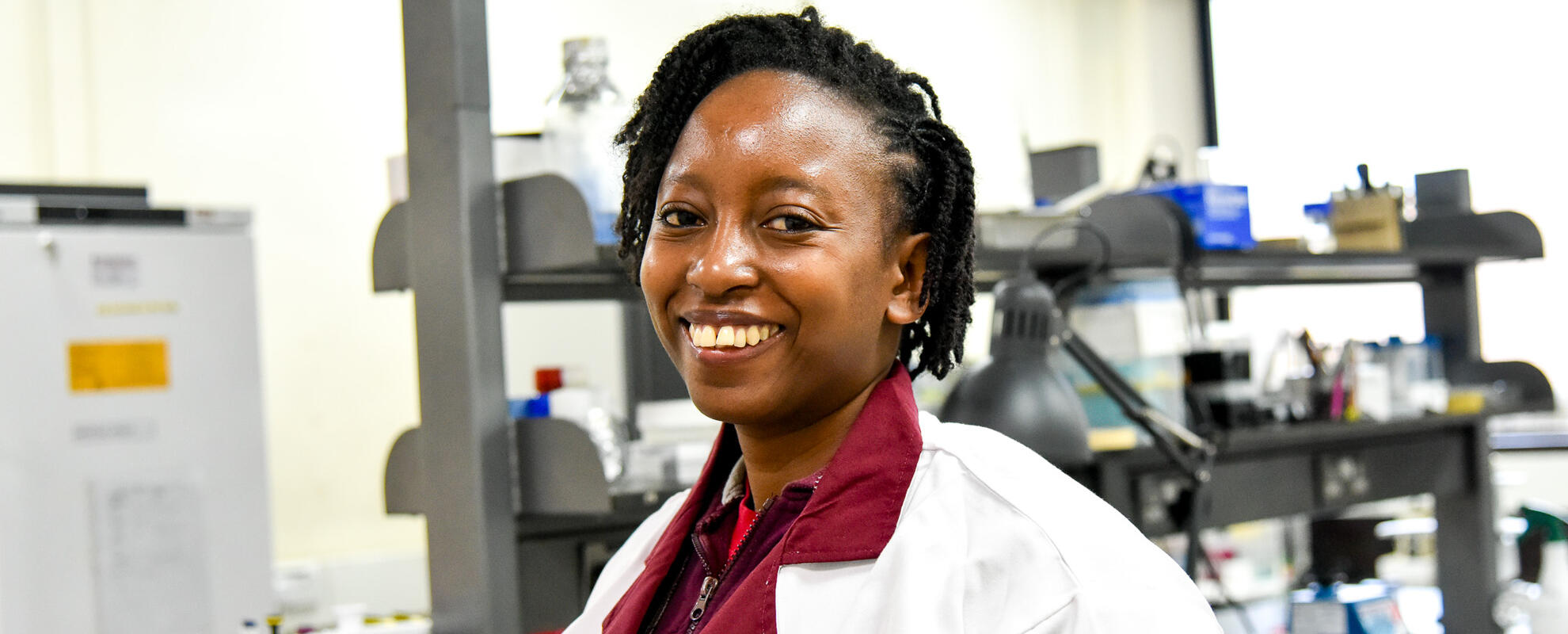 Jane Njaramba posing in one of the ILRI Labs. Photo credit: ILRI/Sarah Nyanchera Nyakeri