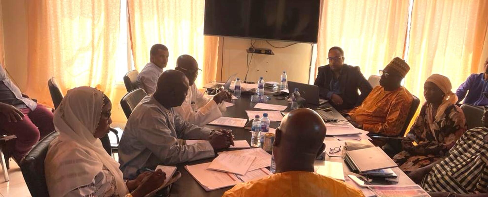 Demba Sabally, the Gambian Minister for Agriculture meets with some of the ministry officials and stakeholders during one of the events to launching the Gambia LMP