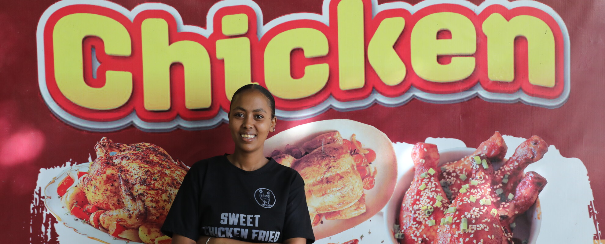 Eden Samuel poses in front of her stall in Adama (photo credit: ILRI/Fenja Tramsen). 