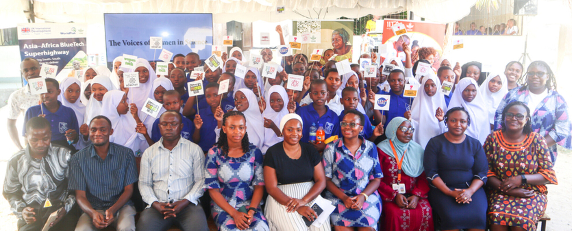 Group photo of CGIAR women with teachers and students during international Day of Women and Girls in Science (Photo credit: IITA/Hadi Rashid)