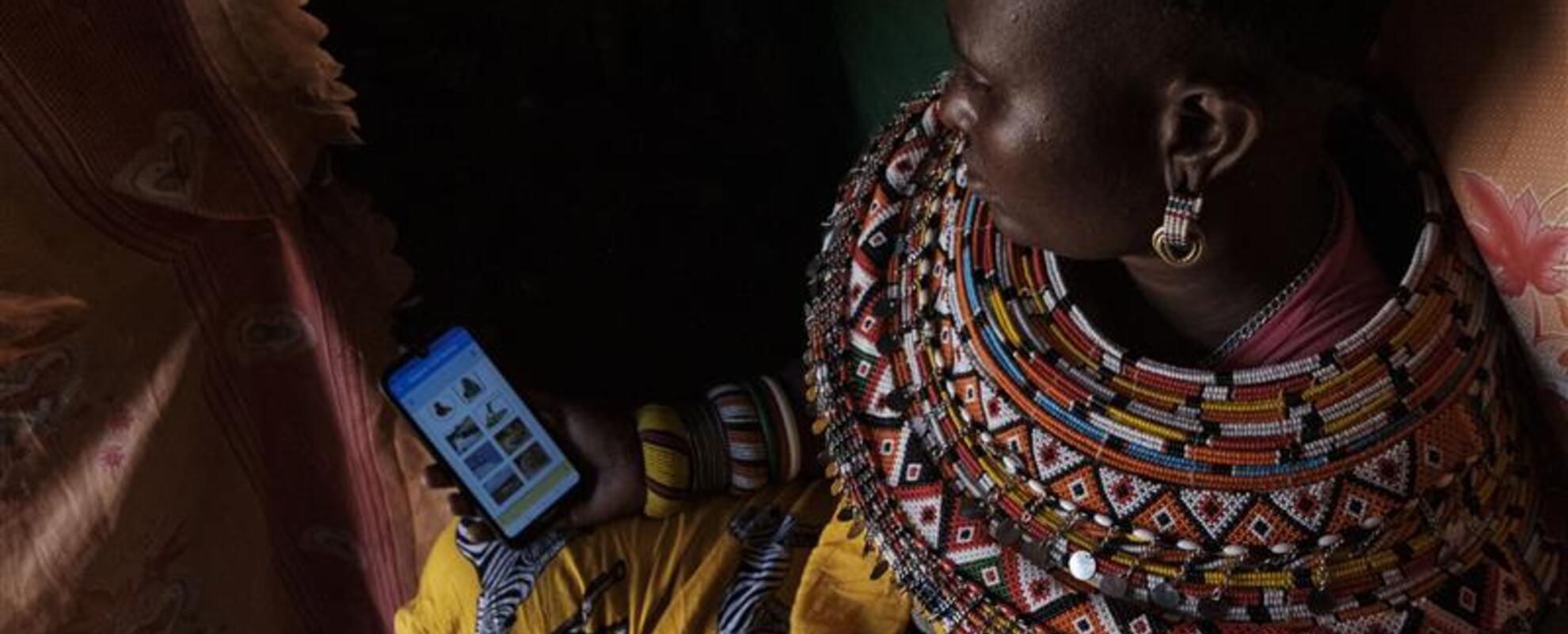 Woman holing mobile phone